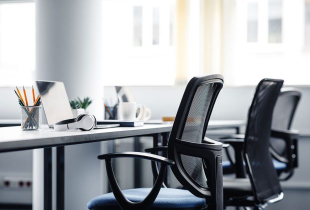 Empty seats in an open plan office