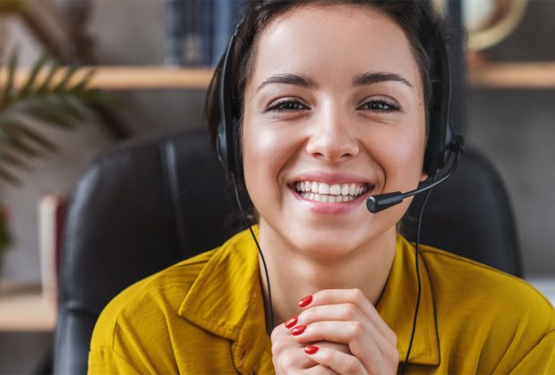 Smiling woman with headset